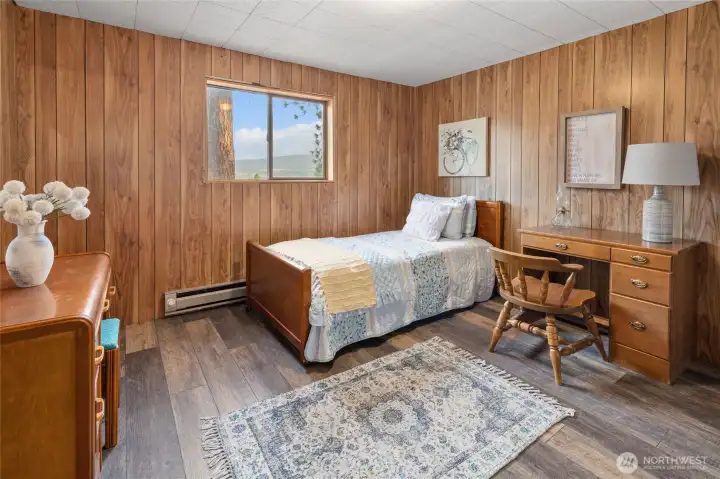 The third bedroom, one of two bedrooms on the upper level.