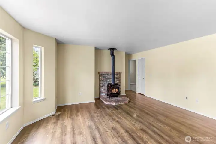 Large living room is open and the center of the home with access to all rooms