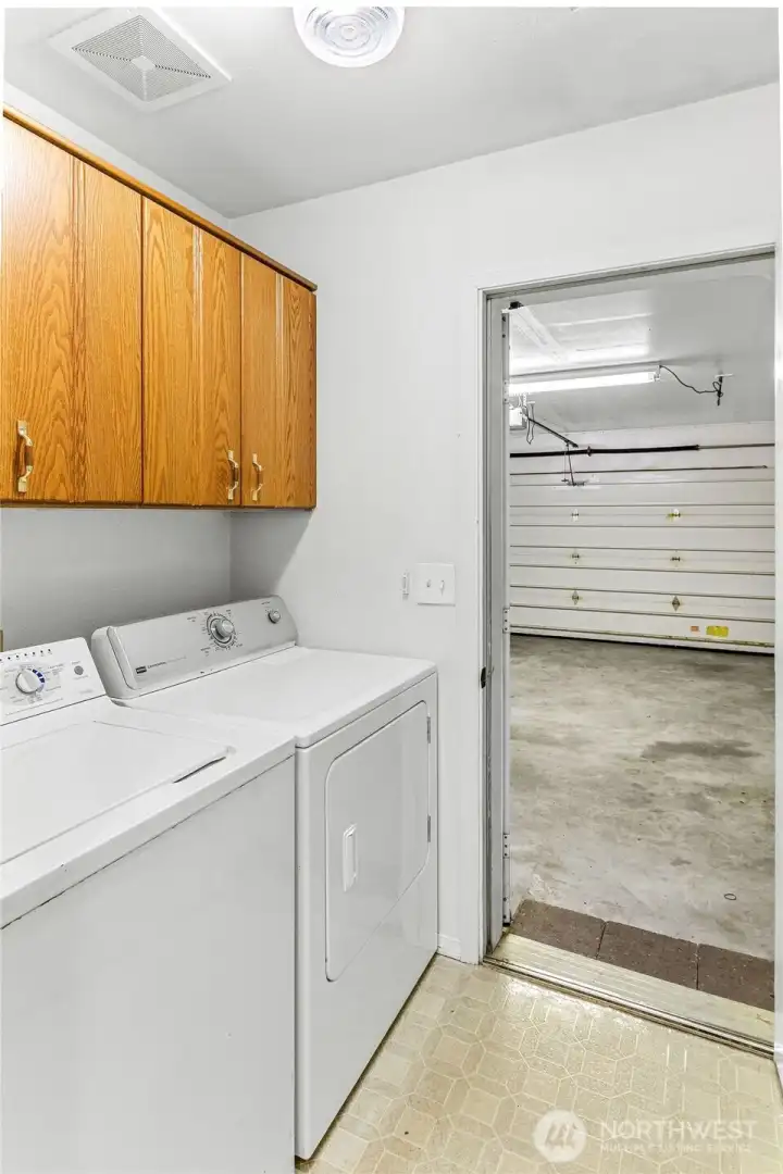 Laundry with storage and inside entry to garage, W/D can convey with sale of home!