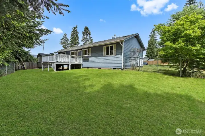 Fenced backyard, space for gardening, or pets, grass has been enhanced