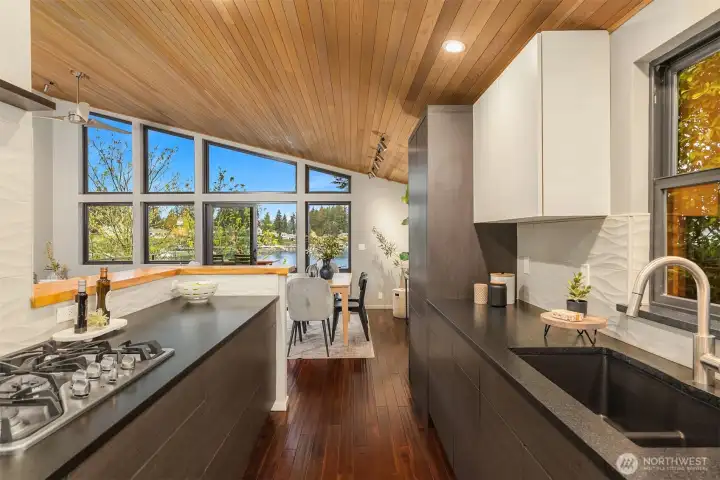 Ample concealed storage in this efficient space keeps countertops clean and clutter-free.