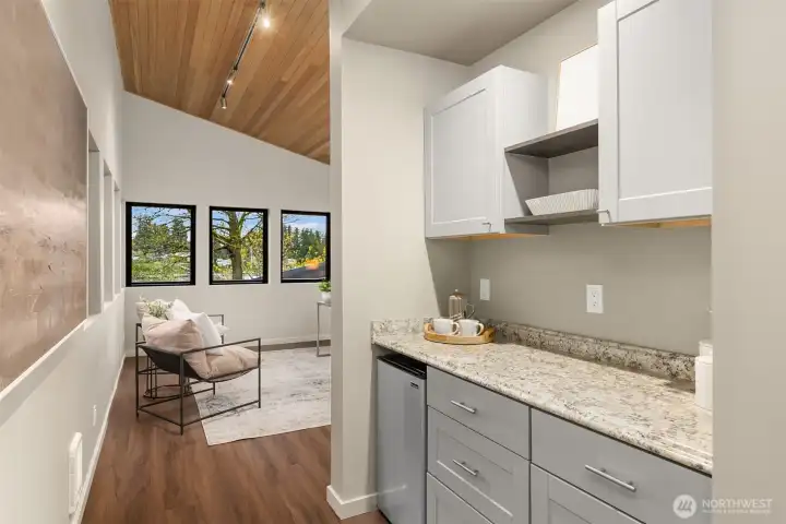 A handy bar area in the Studio with a mini-fridge and good storage.