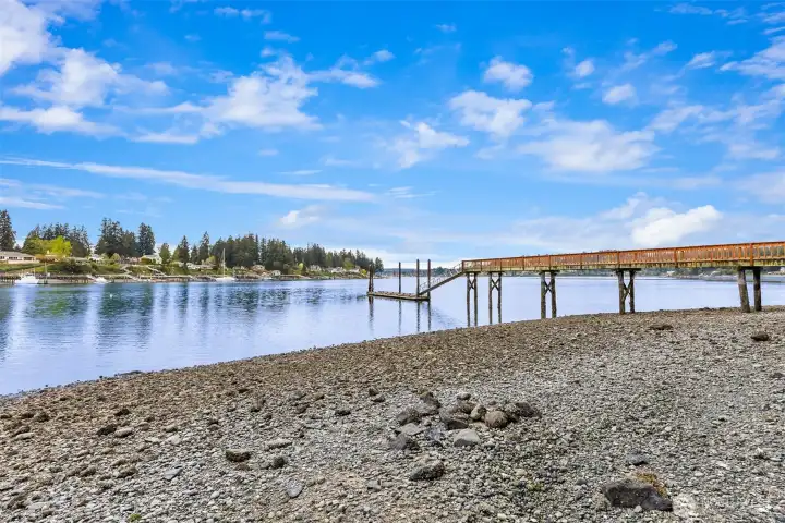 The walkable beach out on the point of the cove.
