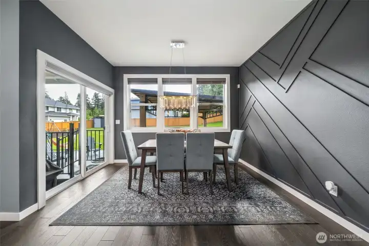 Dining room with slider out to the huge back yard Dining room with slider out to the huge back yard