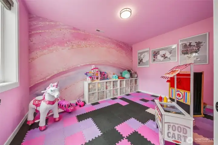 Main floor office/ play room off kitchen Main floor office/ play room off kitchen