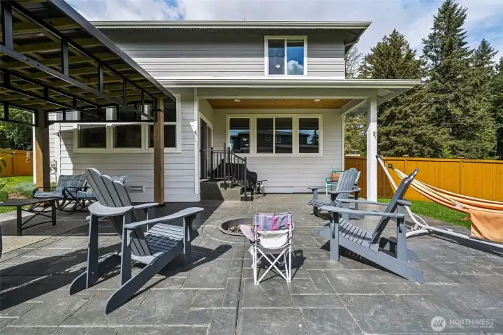 Stamped concrete patio with firepit Stamped concrete patio with firepit