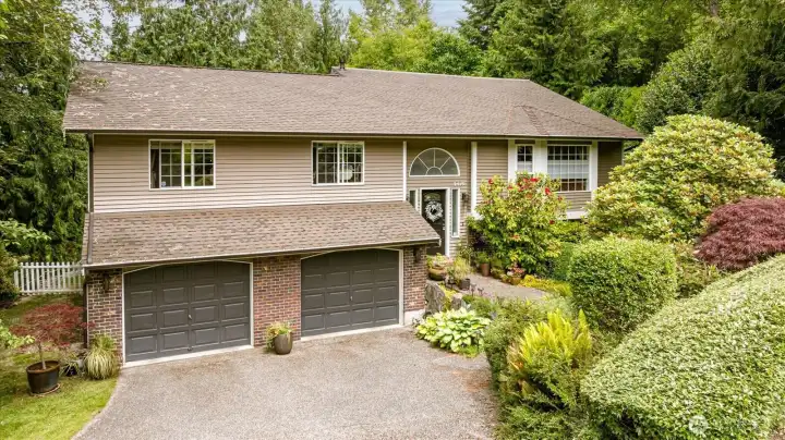 Oversized 2-car garage with ample storage and convenient interior access. Oversized 2-car garage with ample storage and convenient interior access.
