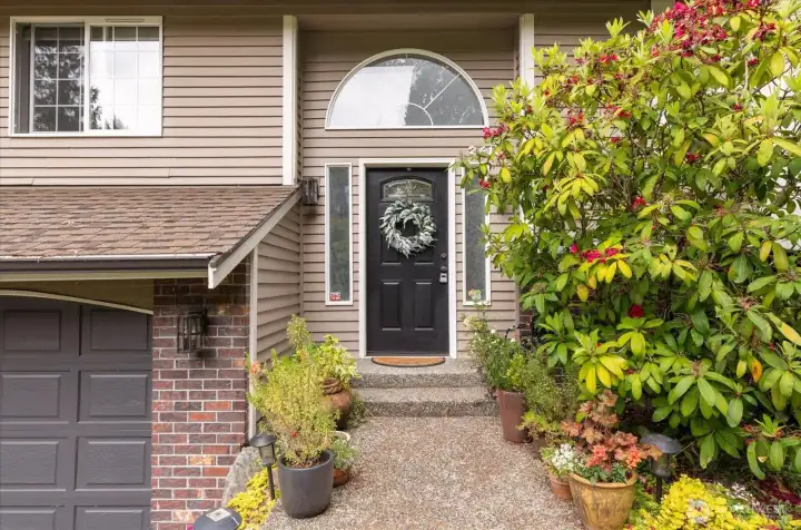 Inviting split-level floor plan with vaulted ceilings and abundant natural light. Inviting split-level floor plan with vaulted ceilings and abundant natural light.