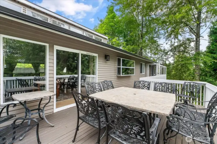 Deck off kitchen with dining area Deck off kitchen with dining area