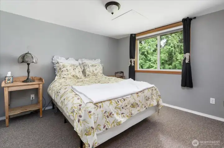 Additional lower-level bedroom and bath provide ideal space for guests, multigenerational living, or work-from-home needs. Additional lower-level bedroom and bath provide ideal space for guests, multigenerational living, or work-from-home needs.