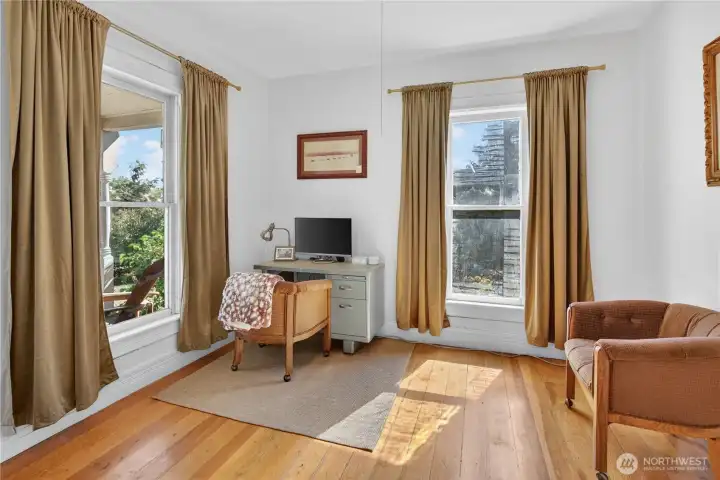 Main floor bedroom with hardwood floors Main floor bedroom with hardwood floors