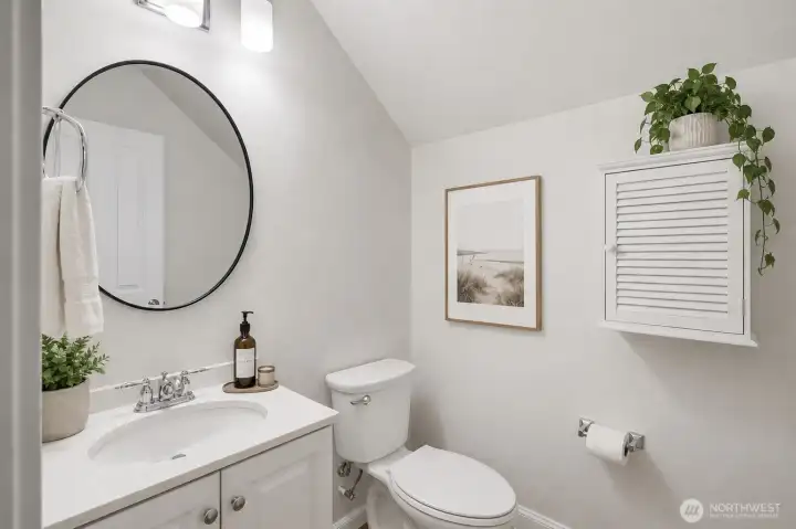 Powder room - main level (virtually staged) Powder room - main level (virtually staged)
