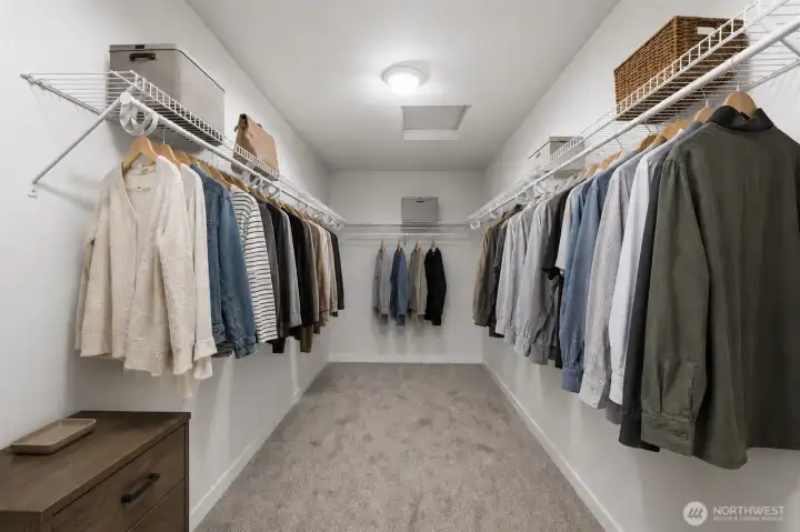 Walk-in closet (virtually staged) Walk-in closet (virtually staged)