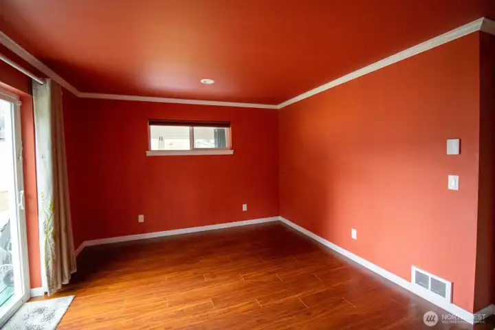 Primary bedroom with hardwood floors and crown molding. Smart thermostats throughout the whole house. Primary bedroom with hardwood floors and crown molding. Smart thermostats throughout the whole house.