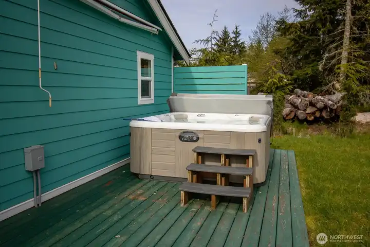 Private hot tub with smart scheduling, an insulated cover and custom wood steps for easy access. Private hot tub with smart scheduling, an insulated cover and custom wood steps for easy access.