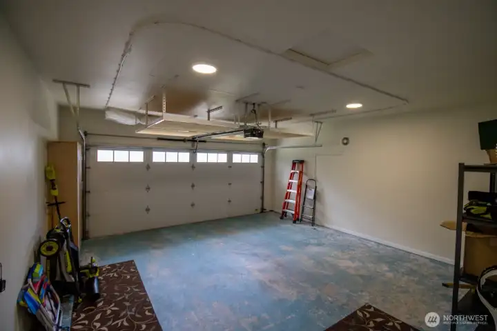 Attached 2-car garage with automatic opener and overhead storage rack. Attached 2-car garage with automatic opener and overhead storage rack.