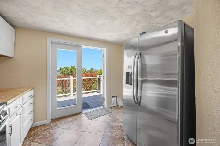 kitchen opens to a small porch kitchen opens to a small porch