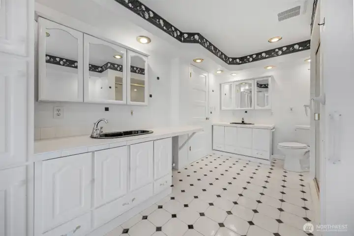 Upstairs bathroom shared by both bedrooms. One of the bedrooms can access the bathroom through the attached sunroom. There is a toilet and Upstairs bathroom shared by both bedrooms. One of the bedrooms can access the bathroom through the attached sunroom. There is a toilet and
