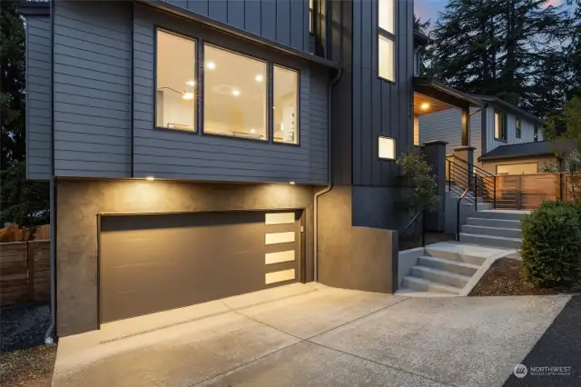 Oversized 2-car Garage with room to park additional cars.