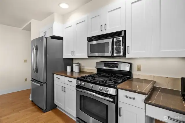 Stainless steel appliances modernize the kitchen for a sleek appearance.