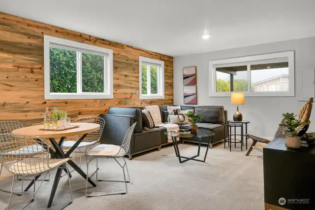 Large family room just a few steps down from the main floor. It can also be used a a fourth bedroom complete with a closet.