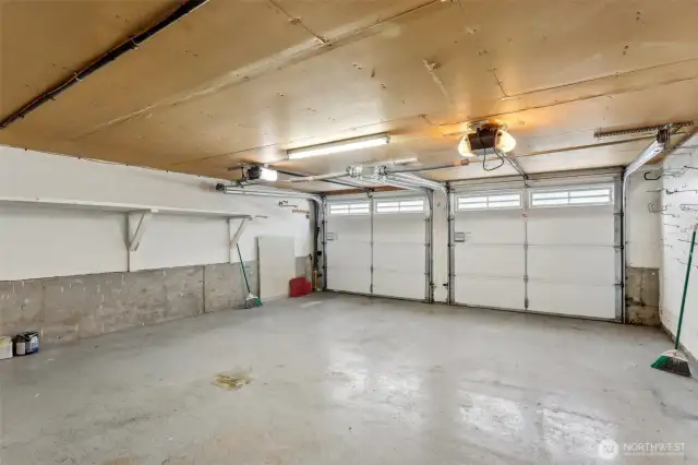 2 car garage with ample shelves & storage space
