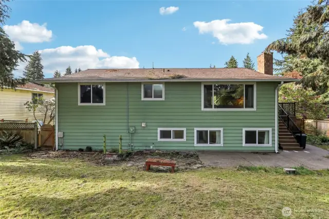Spacious backyard for gardens, entertainment, & more; recently mowed.