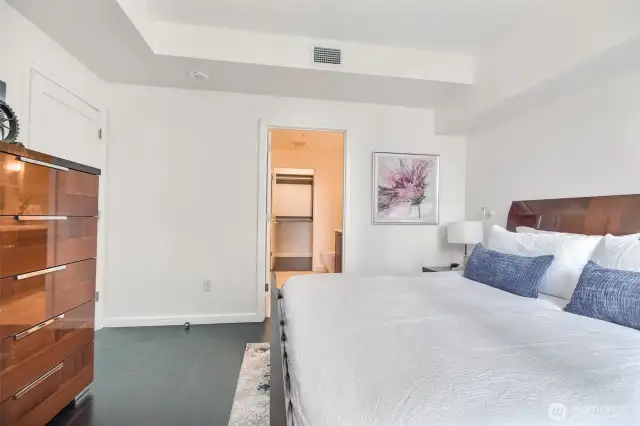 Primary bedroom with hardwood floors