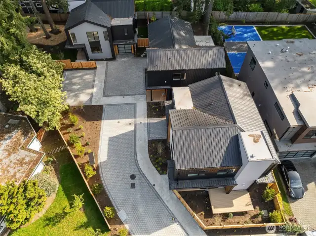 Discover the perfect blend of modern living & comfort in this three-home community nestled in Bridle Trails neighborhood.