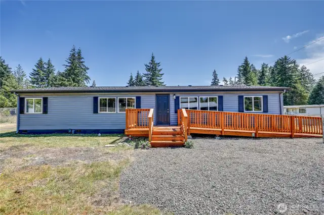 Front of home with steps and ramp