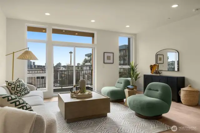 Sun-splashed living area with large windows and seamless access to your private outdoor deck.