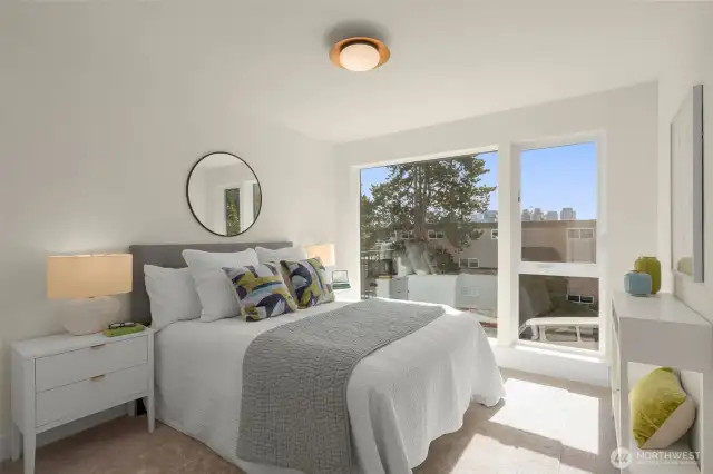 Secondary bedroom with ample natural light—ideal for guests, a nursery, or a cozy retreat.
