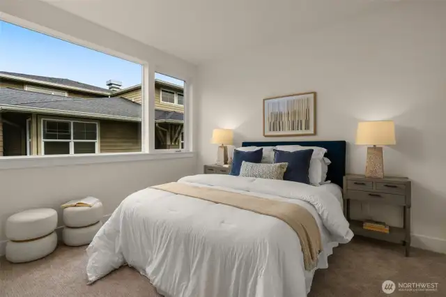 Guest bedroom offers privacy and comfort—ideal for visiting friends or family.