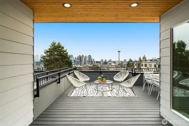 Unforgettable cityscape—from the Space Needle to the twinkling skyline, this rooftop view turns every evening into a masterpiece.