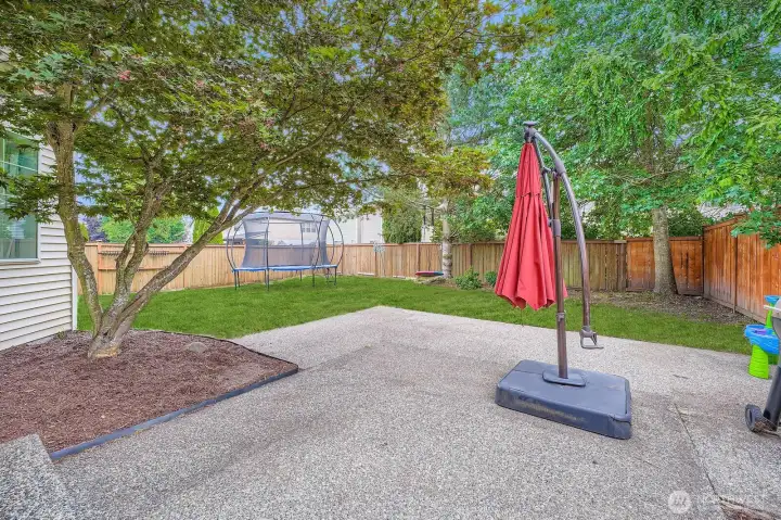 Spacious backyard patio for entertaining and BBQ!