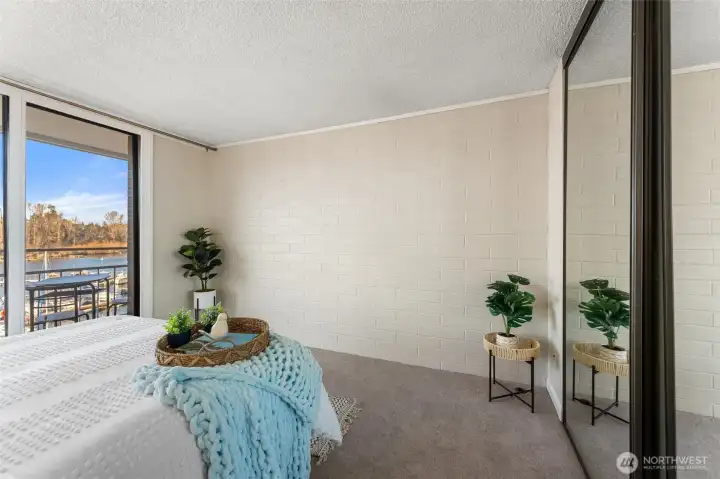 Spacious bedroom layout offering flexibility for seating, workspace, or additional storage.