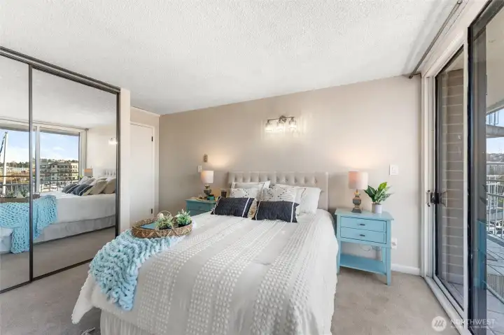 Another angle of the primary bedroom emphasizing indoor-outdoor connection.