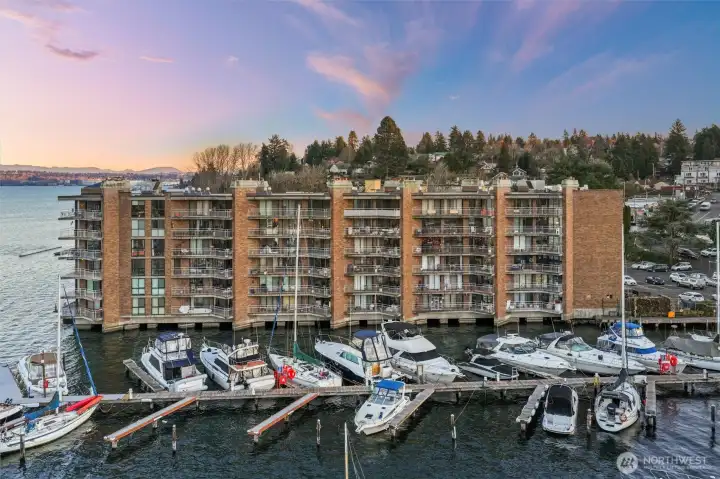 Iconic waterfront setting at Spinnaker Bay Condominiums, surrounded by marinas and serene Lake Washington views.