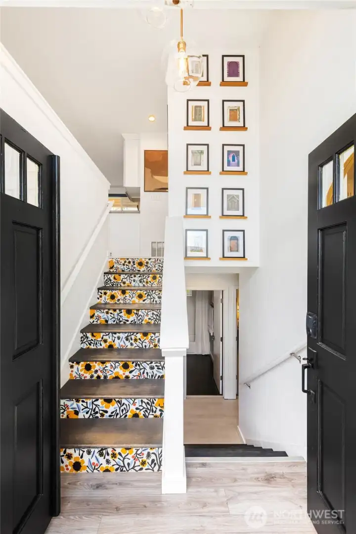 Welcoming entrance with landing leading up or downstairs