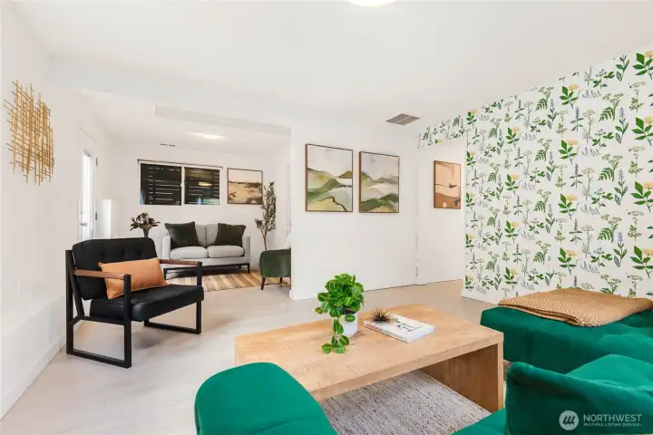 Light-filled daylight basement family room, with bonus area off utility room