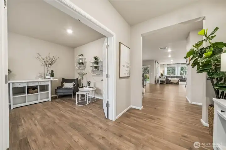 As you enter, office with french doors to the left.