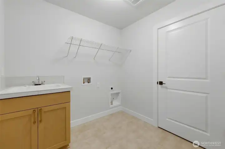 laundry with sink