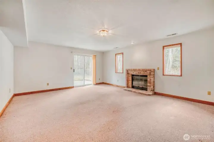 Brick fireplace adds warmth and character.