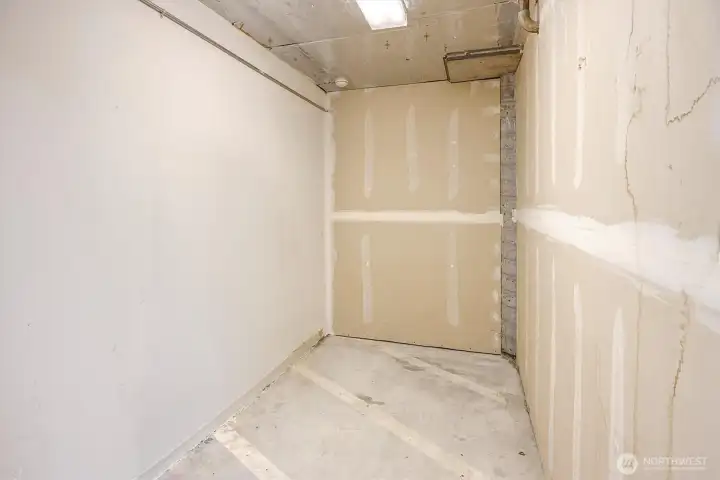Private storage closet in the garage.