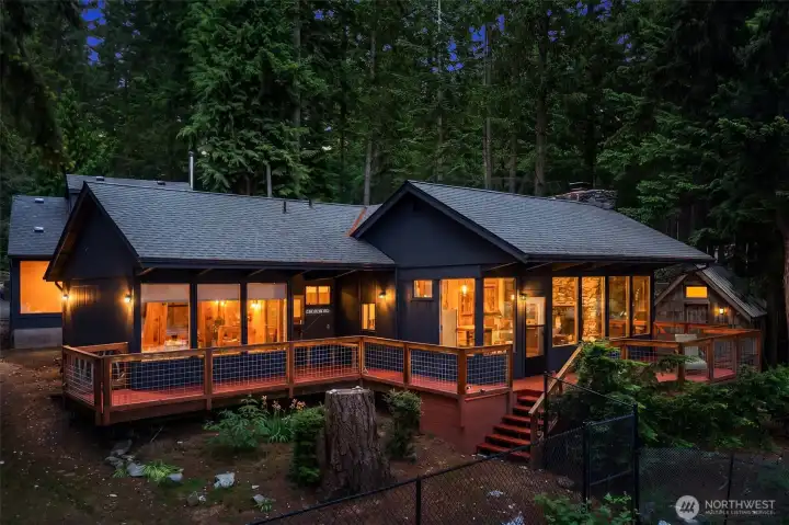 Escape to a one-of-a-kind property surrounded by soaring trees and tranquil natural beauty.