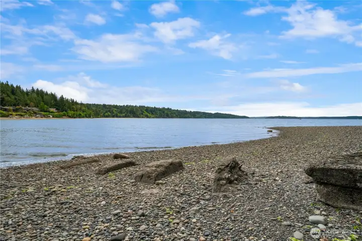 Embrace the calm and beauty of waterfront living with this peaceful retreat by the water.