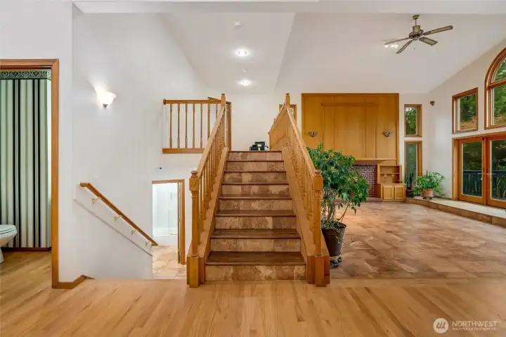 Stairs heading up to the private landing leading to the primary bedroom. Stairs heading up to the private landing leading to the primary bedroom.
