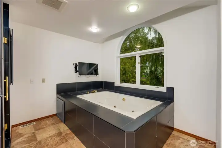 Large soaking tub to relax in peace and tranquility after a long day. Large soaking tub to relax in peace and tranquility after a long day.