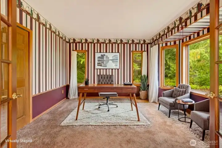 Study on the main level, complete with a closet for potential use as a bedroom. Study on the main level, complete with a closet for potential use as a bedroom.