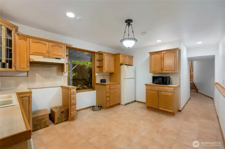 Second kitchen space in lower level with a separate entrance. Second kitchen space in lower level with a separate entrance.